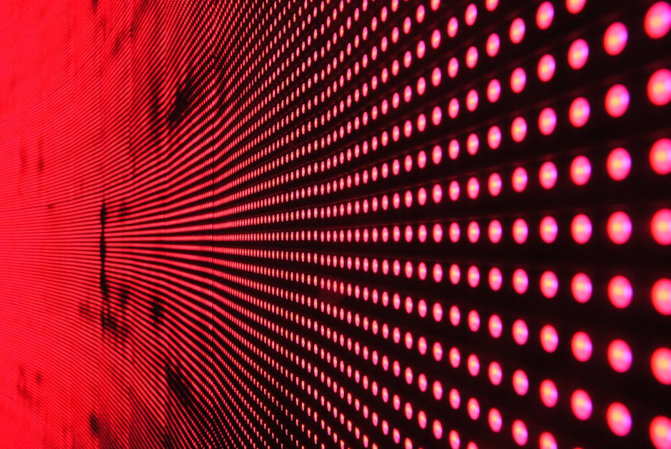 Vibrant abstract pattern of illuminated red LED lights forming a dynamic design